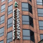 Vertical building sign for Associated Bank.