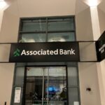 Interior business sign with logo for bank.