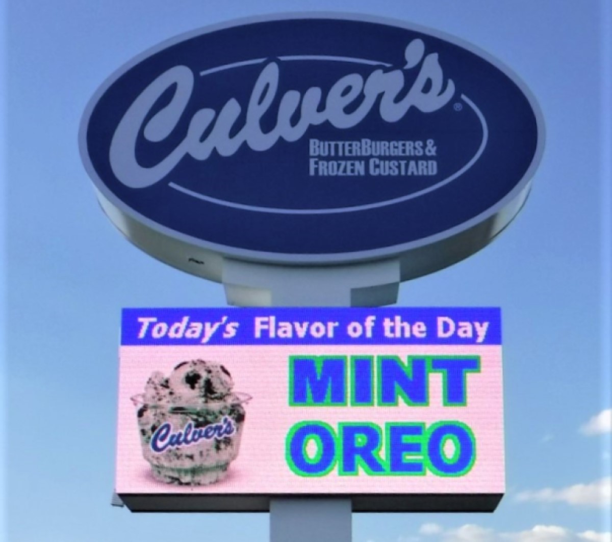 Outdoor digital screen and business sign.