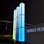 Glass tower monument sign for hospital.