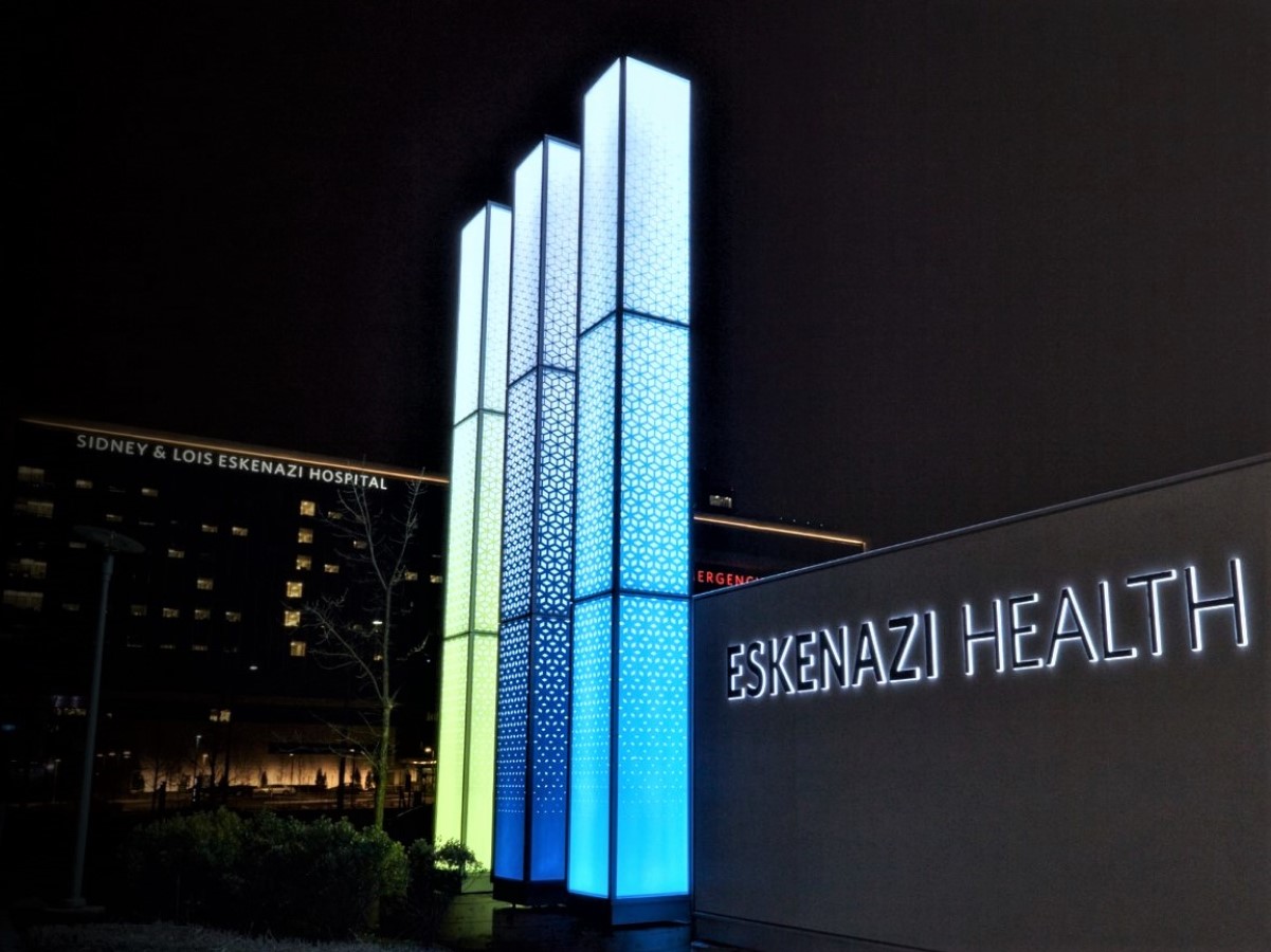 Glass tower monument sign for hospital.