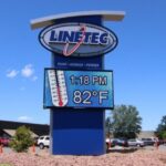 Outdoor commercial sign with digital screen.