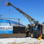 Campus sign installation.