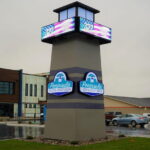 Multi-facet outdoor business sign.